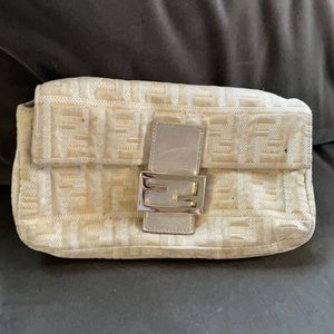 authentic Fendi clutch. baguette clutch style gold